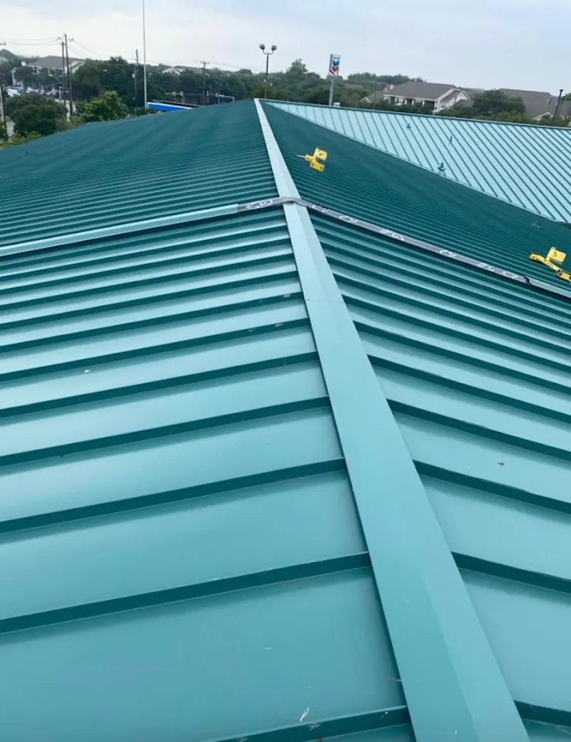 Green commercial metal roof ridge and valley for Metal Roof Repair in Joplin