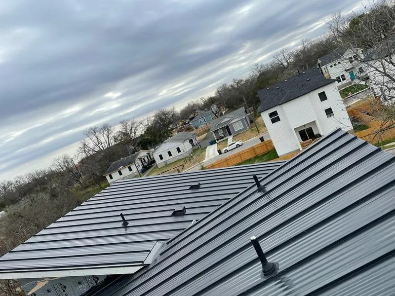 Standing seam metal roof panels with vents for Skylight Repair in Joplin